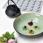 GOURMAND STAMPO IN SILICONE 300 X 175 MM - 24 IMPRONTE TRIANGOLI 33 X 32 X H 10 MM - TONDO Ø 34 X H 9 MM VOL. 6 ML