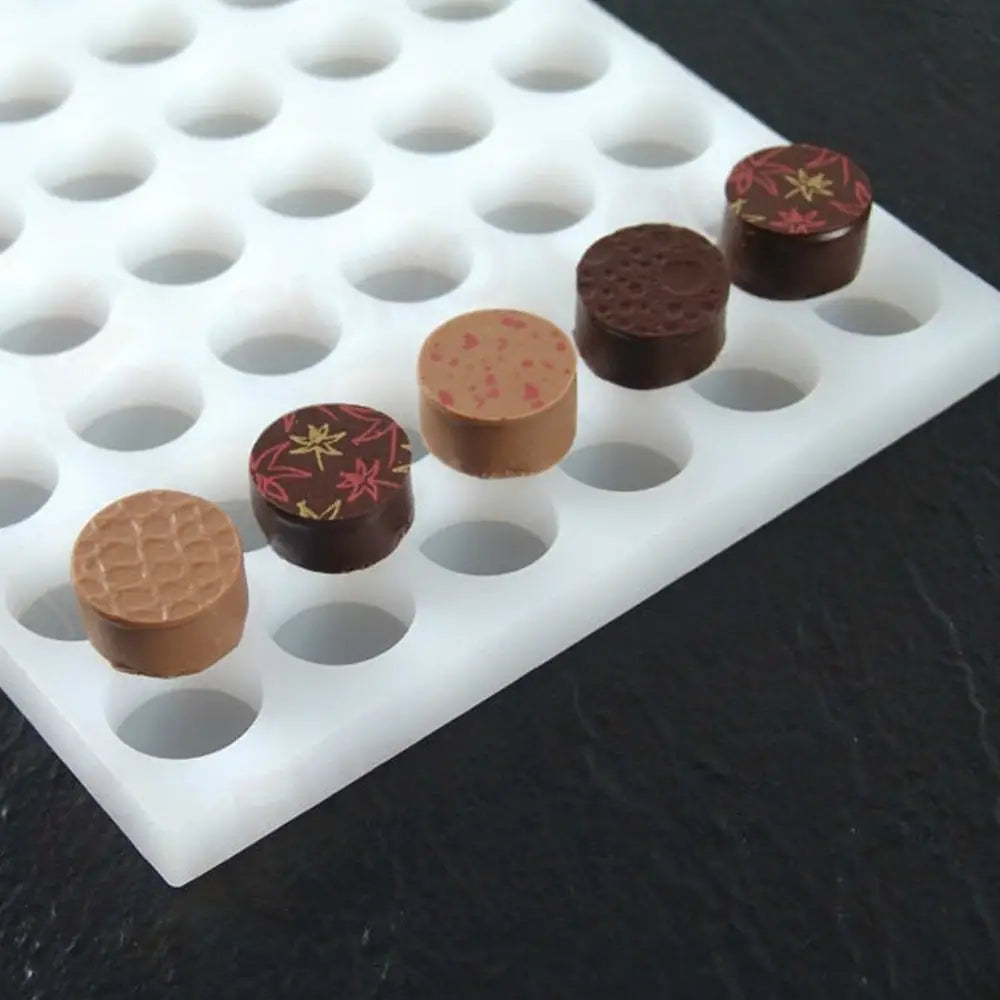 STAMPO IN SILICONE CHOCOFLEX 290 X 190 MM - 54 IMPRONTE Ø 26 X H 14 MM - LS01 - PAVONI ITALIA - STAMPI