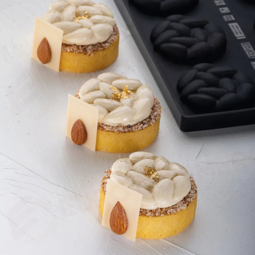 TOP IN SILICONE PER MONOPORZIONI MINI ALMONDS LAGHI E CARIDI - 8 IMPRONTE Ø MM 60X14 H VOL. ~ 28 ML - DIM STAMPO MM